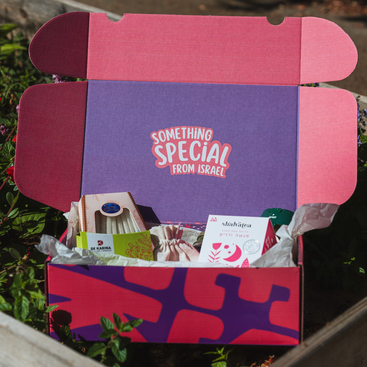 Chanukah Gift Box featuring artisanal Israeli products in a colorful open gift box labeled "Something Special from Israel"