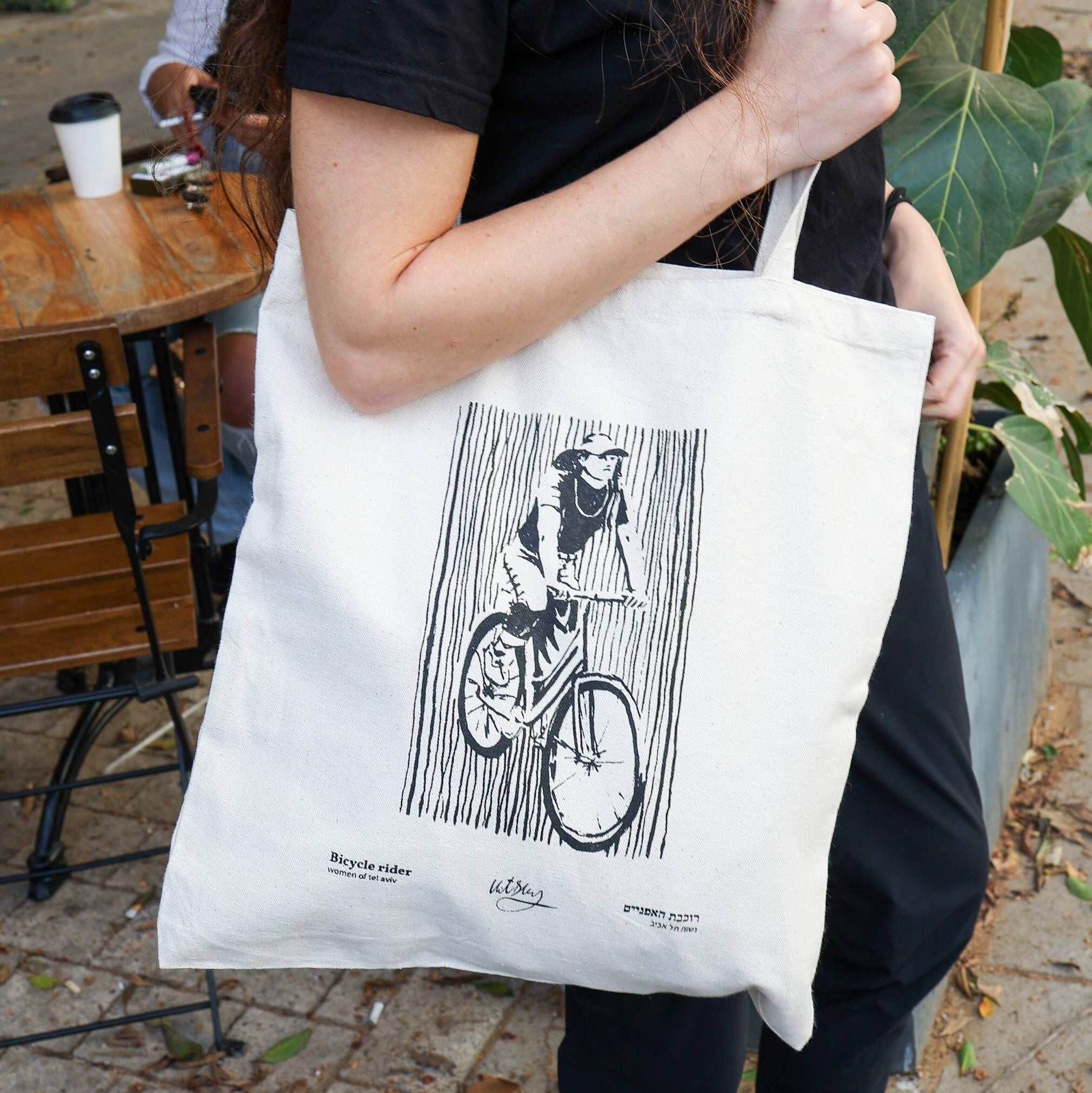 Bicycle Rider Tel Aviv canvas tote bag featuring Vitsky's black and white bike rider sketch on sustainable fabric