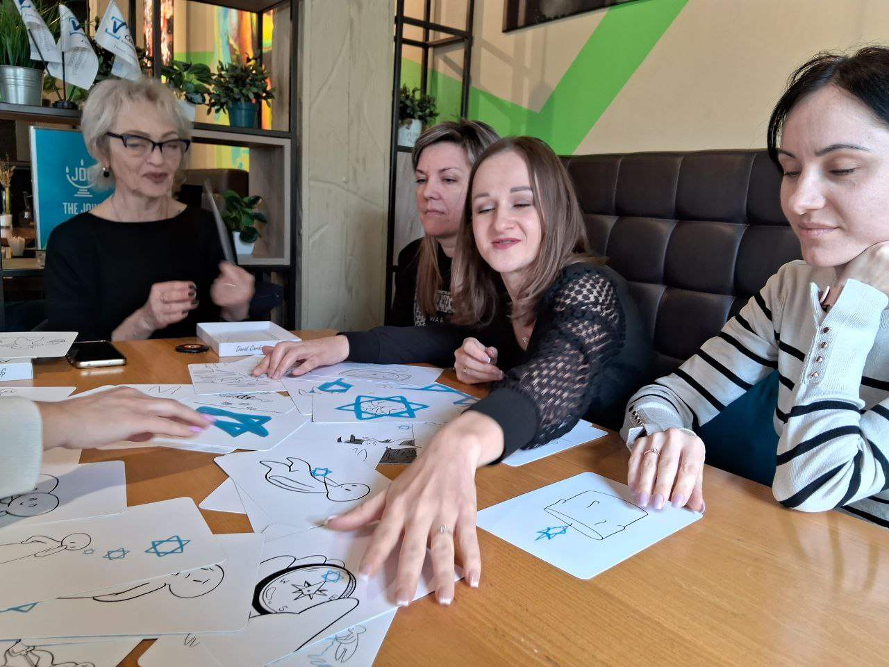 Participants engaging with David Cards Israel Education Card Set for Jewish identity discussions.