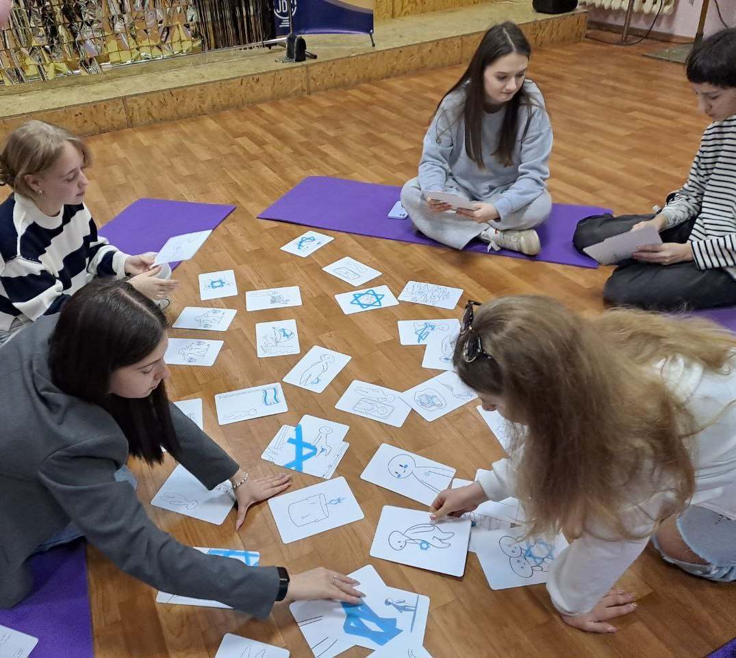 Participants engaging with David Cards Israel Education Card Set during a group session.