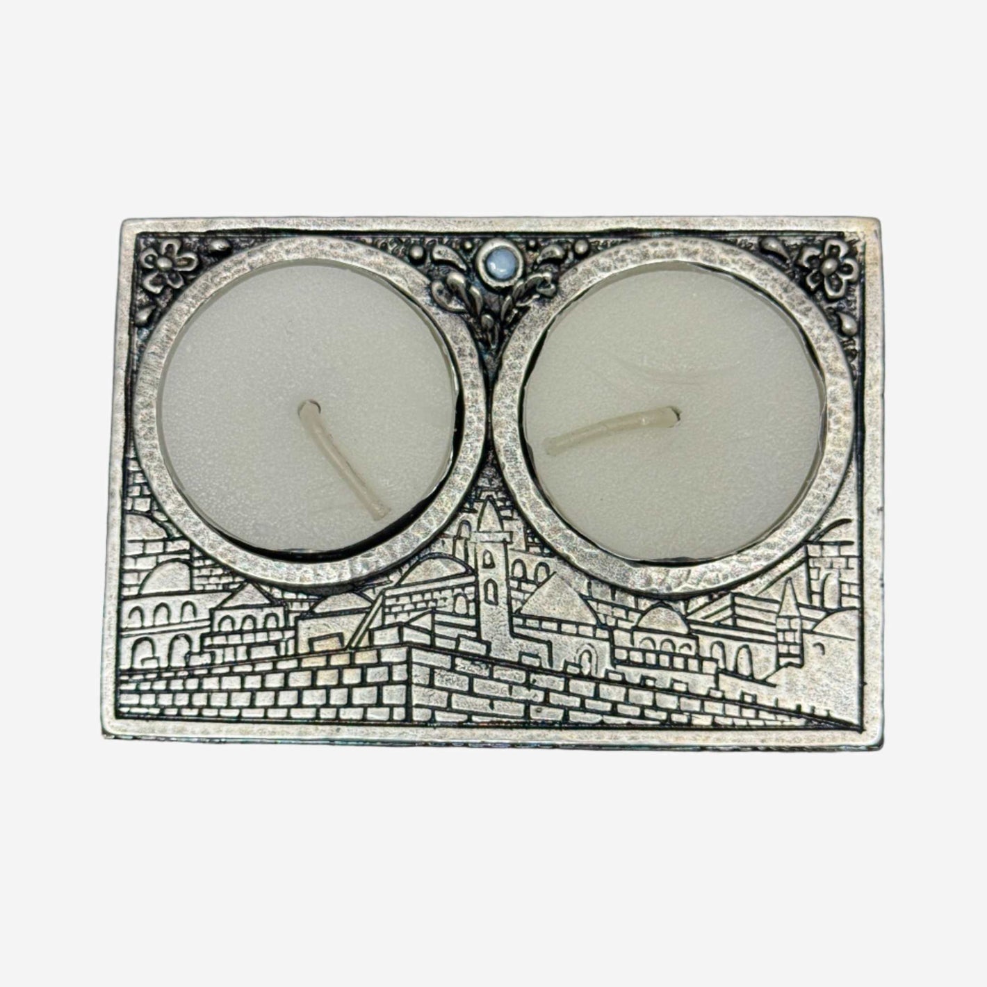 Silver-plated Jerusalem-inspired travel Shabbat candle holder with blue stone detailing by Elad Casting