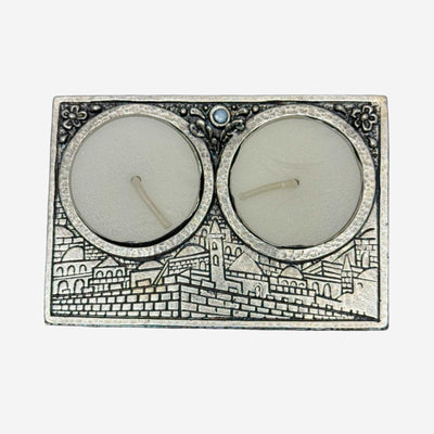 Silver-plated Jerusalem-inspired travel Shabbat candle holder with blue stone detailing by Elad Casting