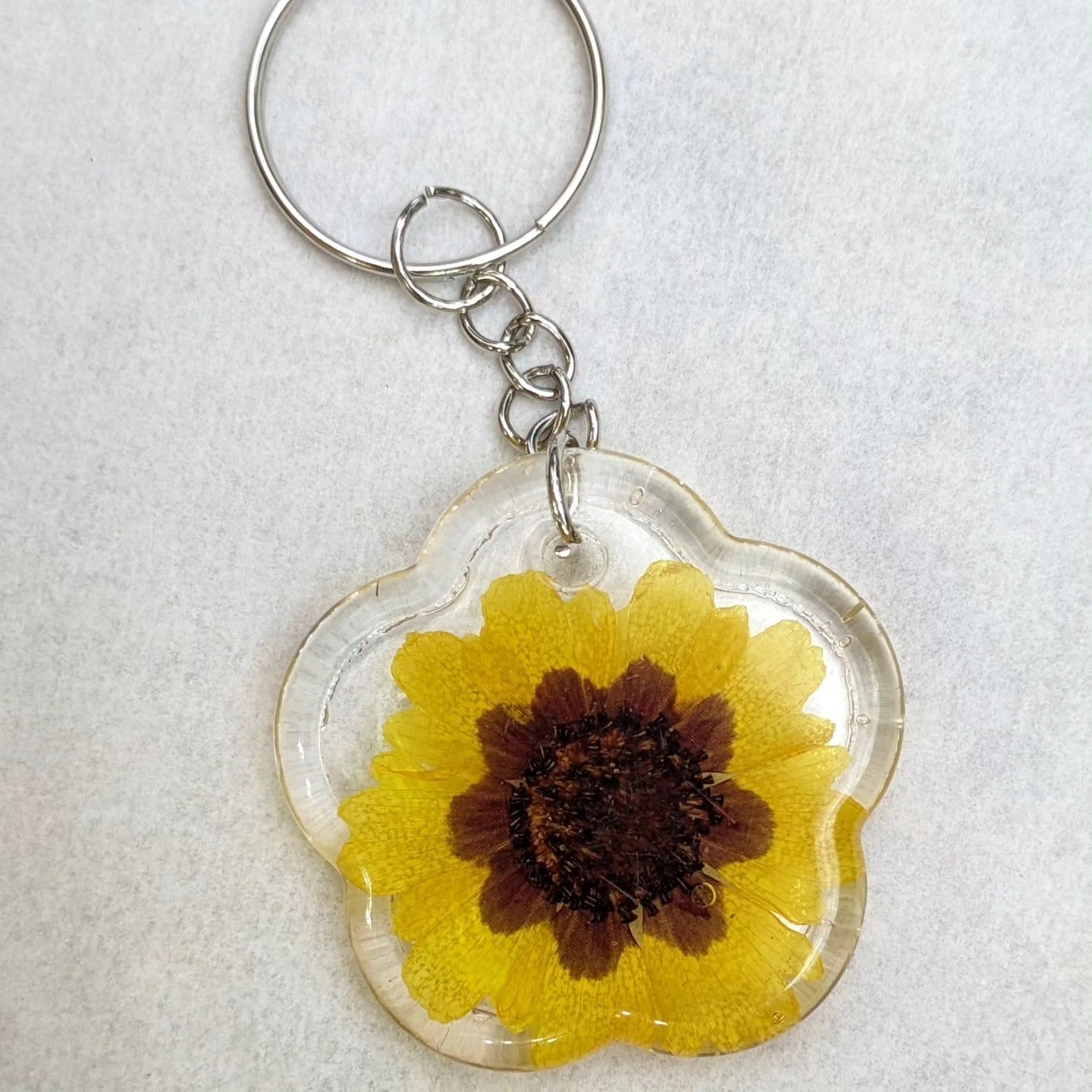 Israeli dried flowers preserved in epoxy resin keychain by Epoxy Lady