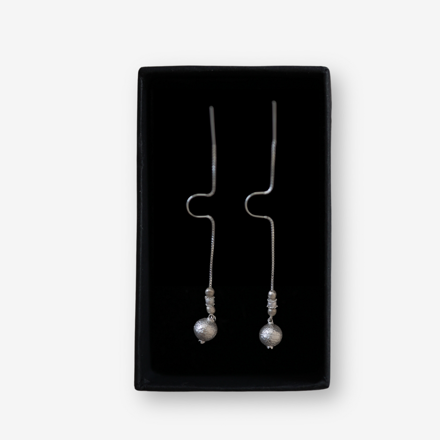 Handmade silver pomegranate earrings with delicate bead design symbolizing abundance and heritage