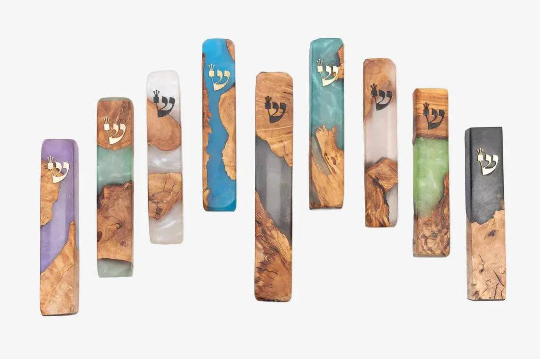 Handcrafted Galilee olive wood and resin mezuzah with unique grain and modern design by Israeli artisan Eial Ovin
