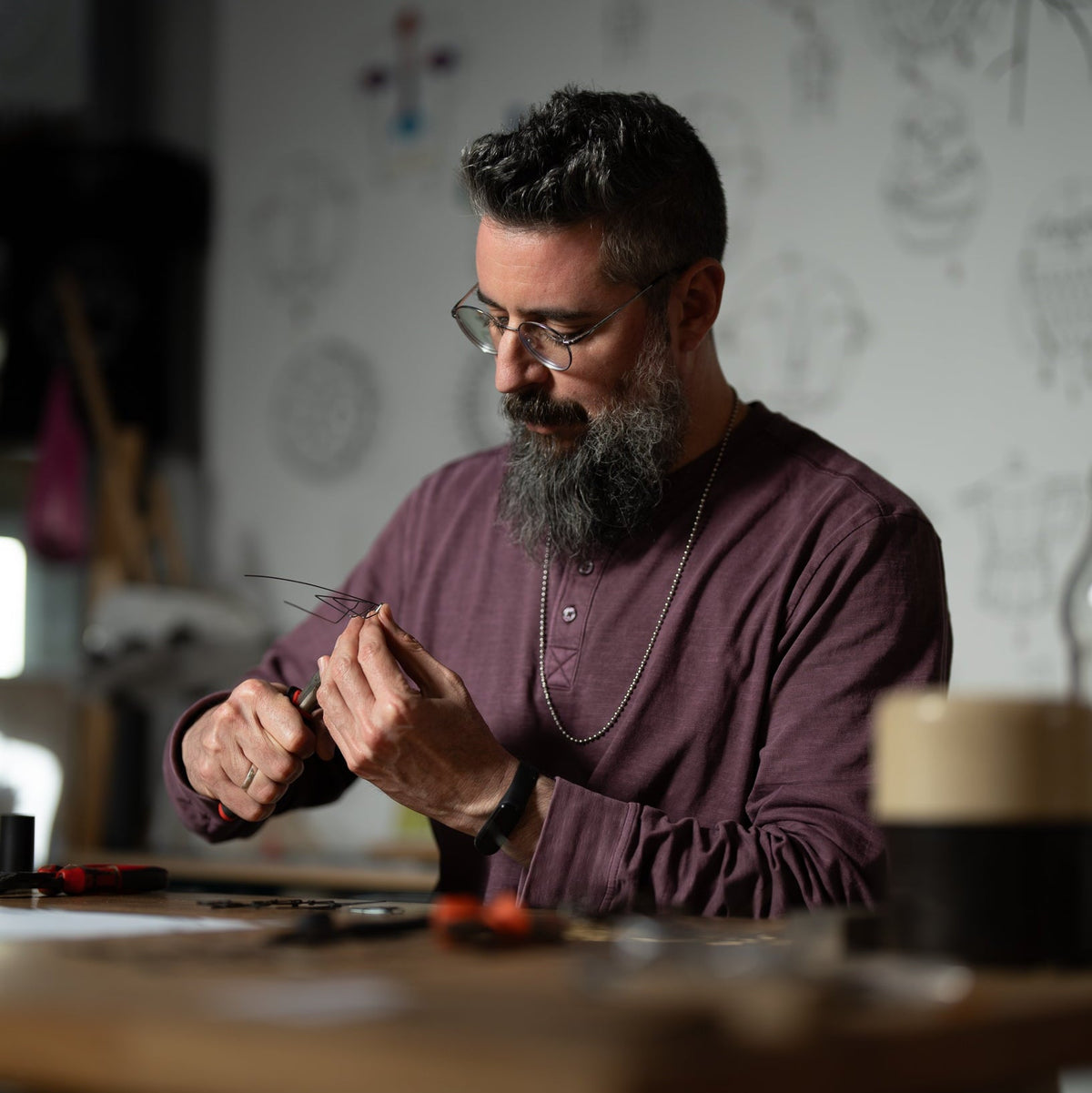 Koby Sibony shaping iron wire in his Western Galilee studio