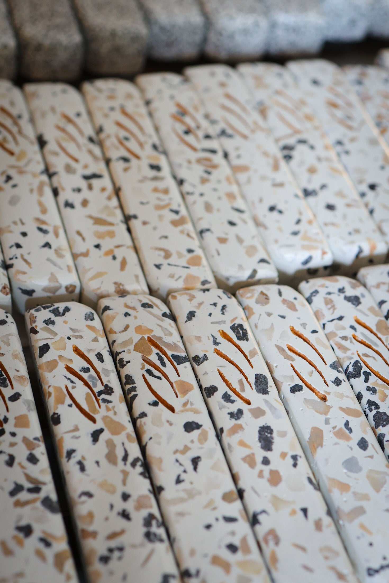 Small Israeli terrazzo mezuzah with Sinai stones by Berko Design Studio, handcrafted and inspired by Bauhaus architecture