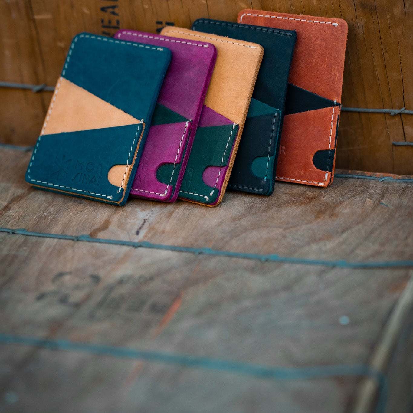 Handmade leather card wallet with blue and tan tones, crafted from premium Italian leather by Mor Sinai
