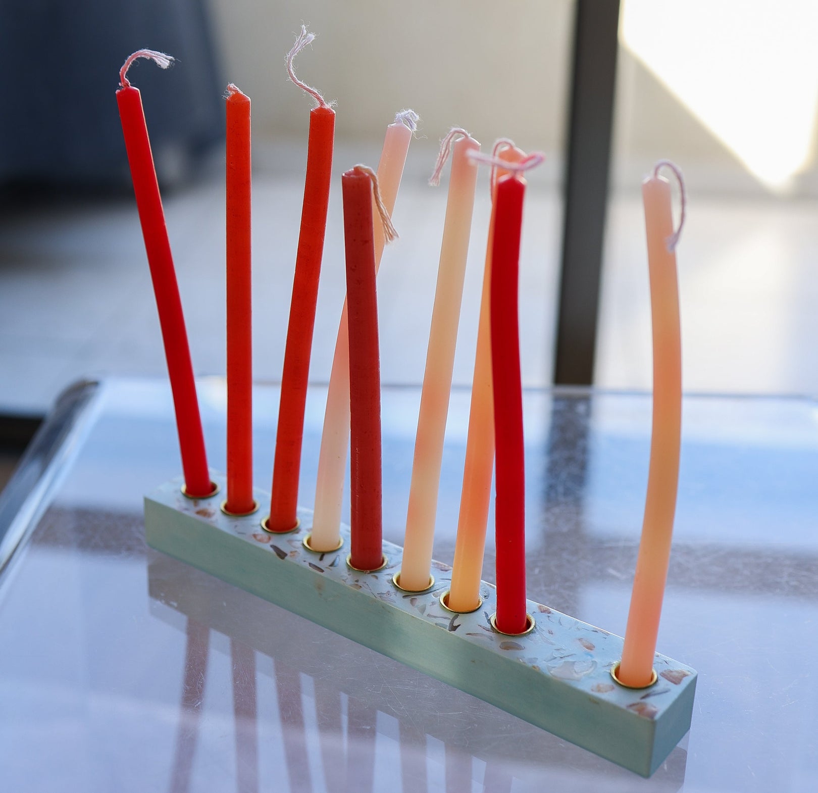 Blue Israeli seashell menorah handmade by Dalia with Jesmonite and real seashells in terrazzo pattern
