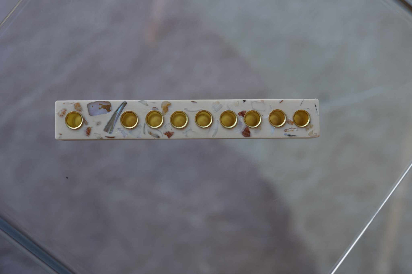 Israeli Seashell Chanukah Menorah made from white Jesmonite with real seashells and terrazzo pattern