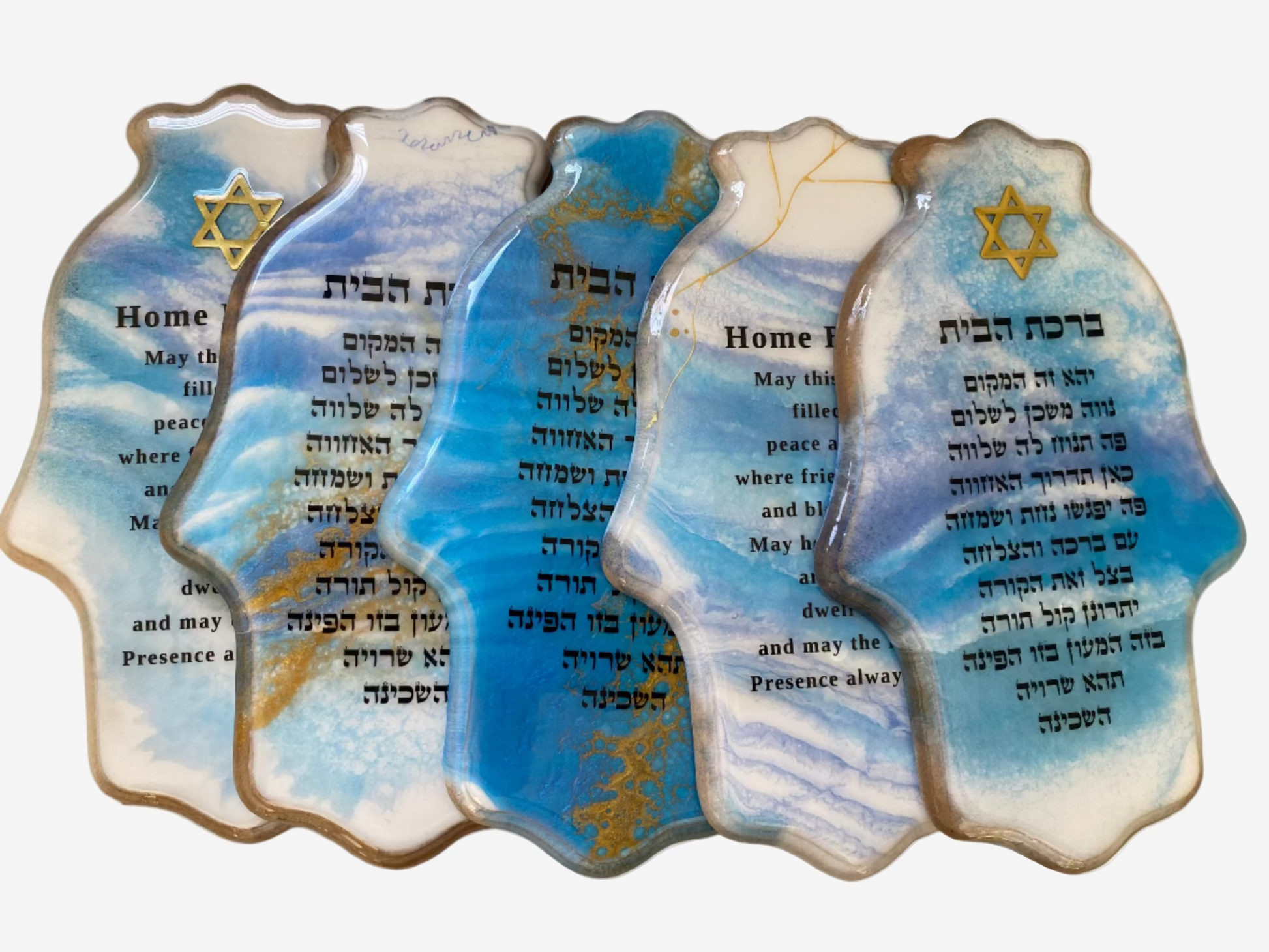 Set of ceramic Hamsa wall plaques with blue and white marbled design, gold Star of David, and English blessing for home text