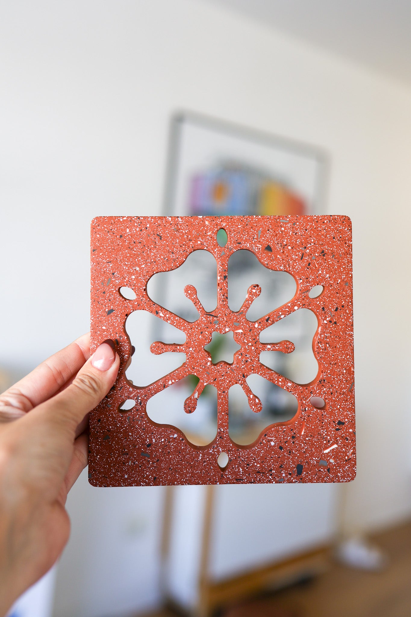 Hametarrezzet Flower Tile Being Held