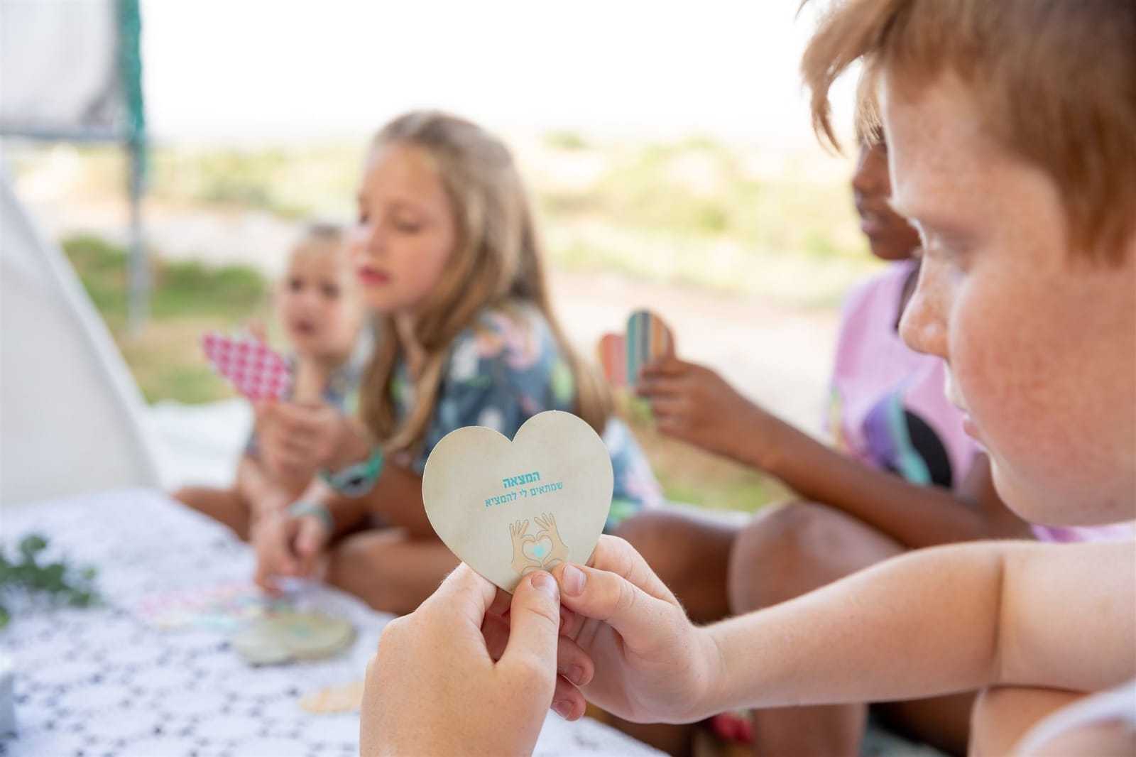 Kids Playing Hooga Heart of Home Game