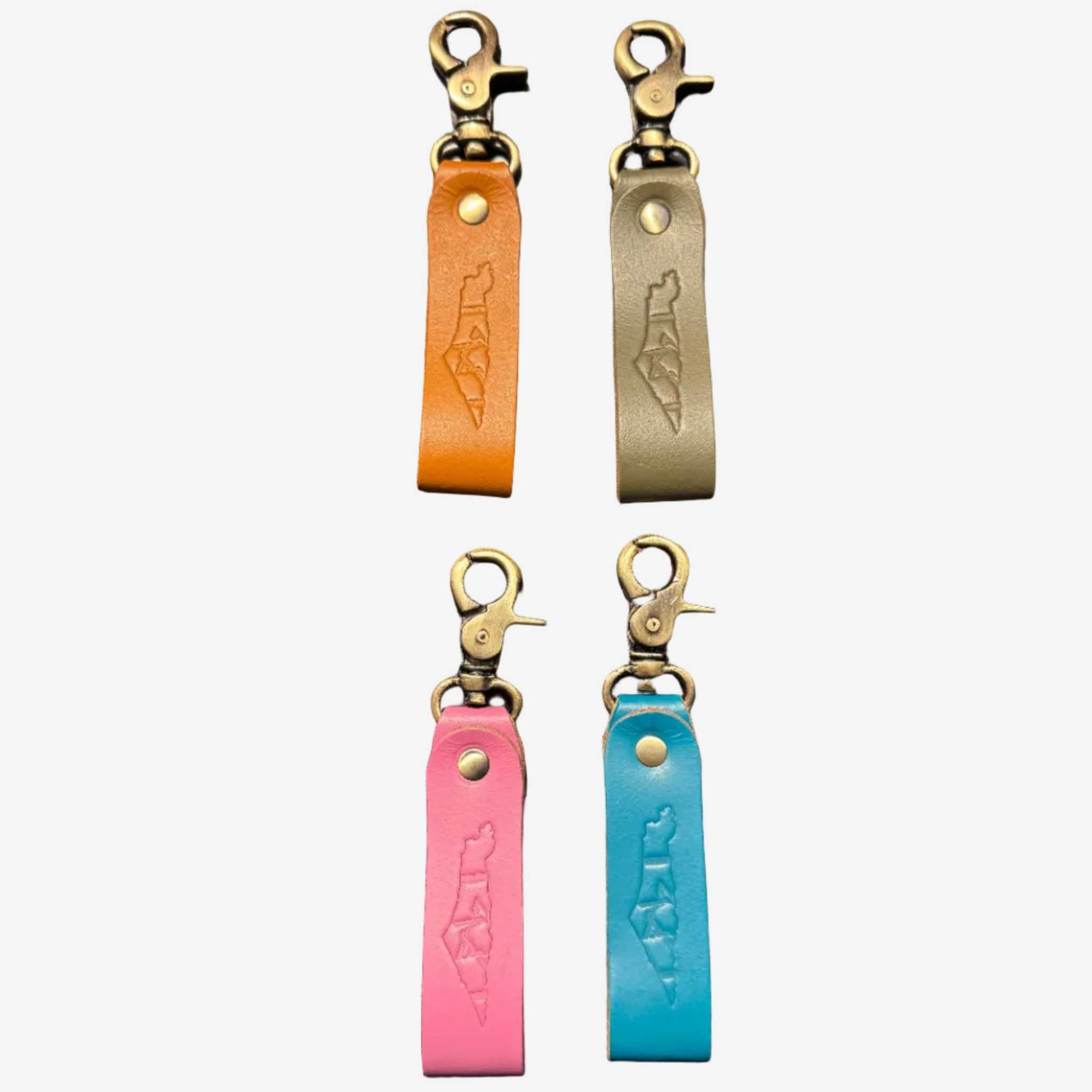 Handcrafted minimalist leather keychain in blue and tan with geometric design by Mor Sinai