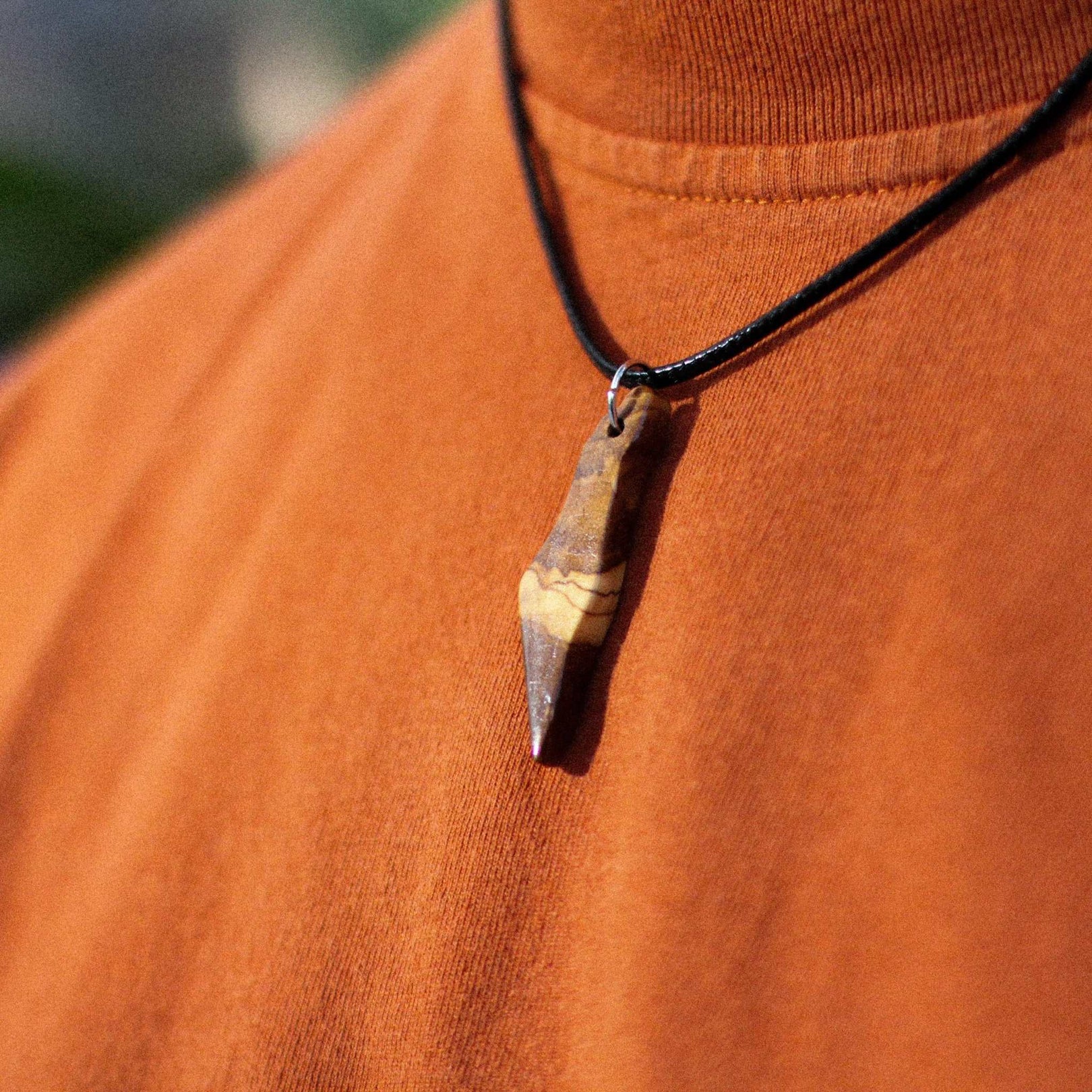 Handmade olive wood necklace from Israel crafted by ArtistaV with natural grain and smooth finish