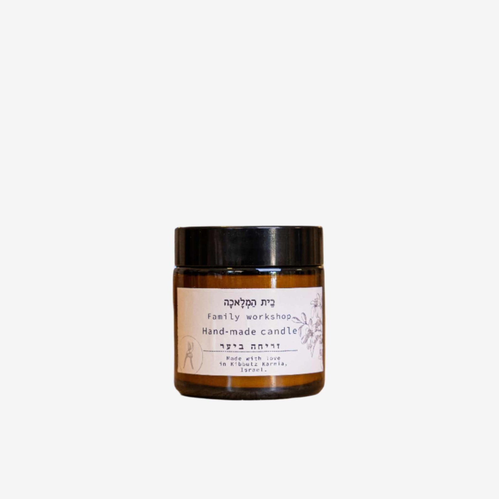 Handcrafted natural beeswax candle from Beit HaMelacha with subtle scent and minimalist design