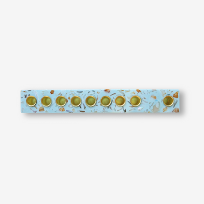 Blue Israeli seashell menorah handmade by Dalia with eco-friendly Jesmonite and real seashells in terrazzo style