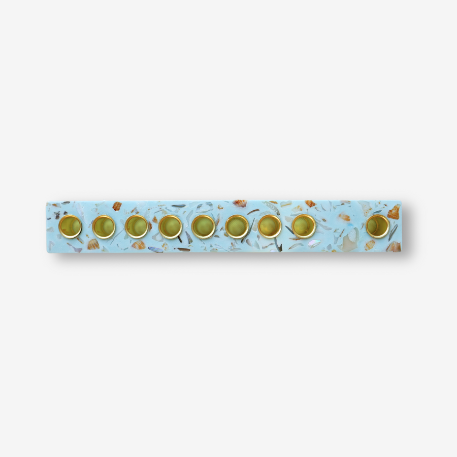 Blue Israeli seashell menorah handmade by Dalia with eco-friendly Jesmonite and real seashells in terrazzo style