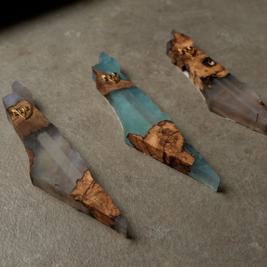 Handmade epoxy and olive wood mezuzah with smooth resin finish and natural wood grain texture