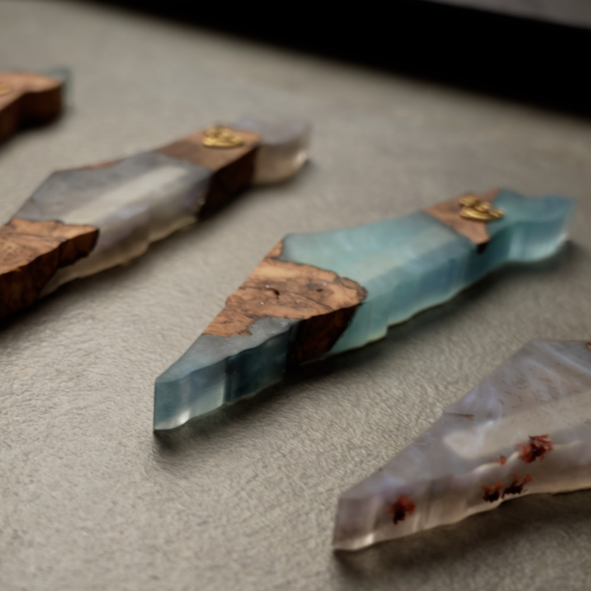 Handmade epoxy and olive wood mezuzah with smooth resin finish and natural grain texture