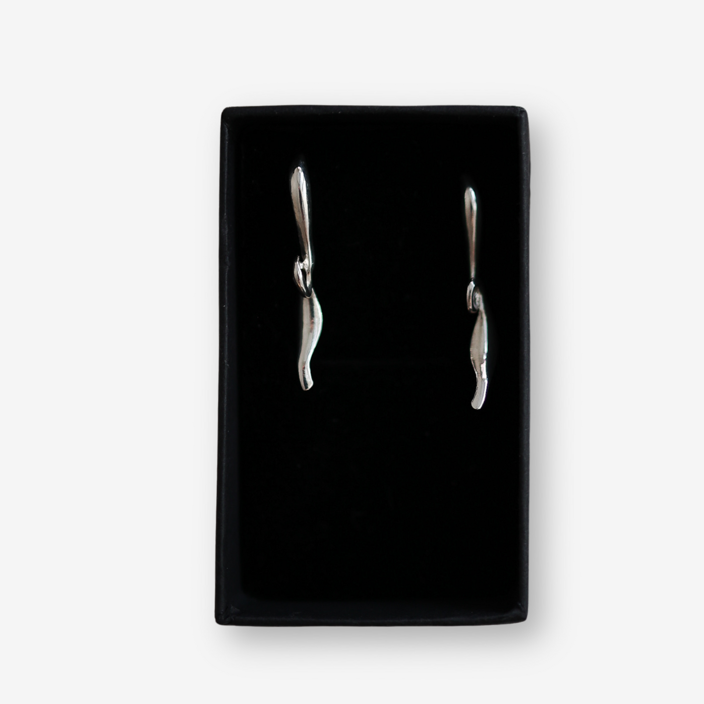 Flow silver handmade earrings in .925 sterling silver inspired by Israeli urban design from PRE Jewelry