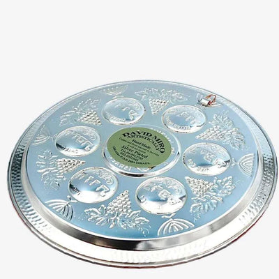Handcrafted silver and copper Seder plate by David Miro showcasing traditional hammered craftsmanship for Passover.