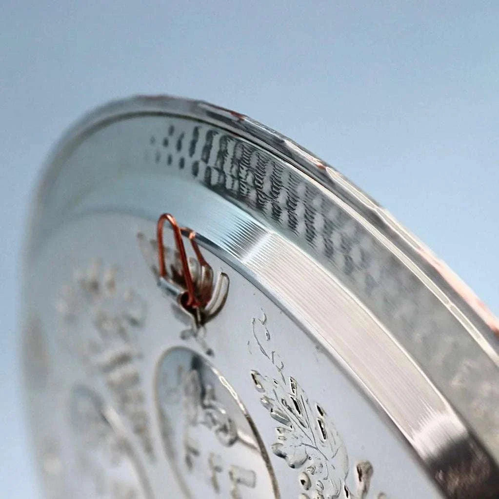 Handcrafted silver and copper Seder plate by David Miro with traditional hammered design