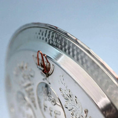 Handcrafted silver and copper Seder plate by David Miro with traditional hammered design