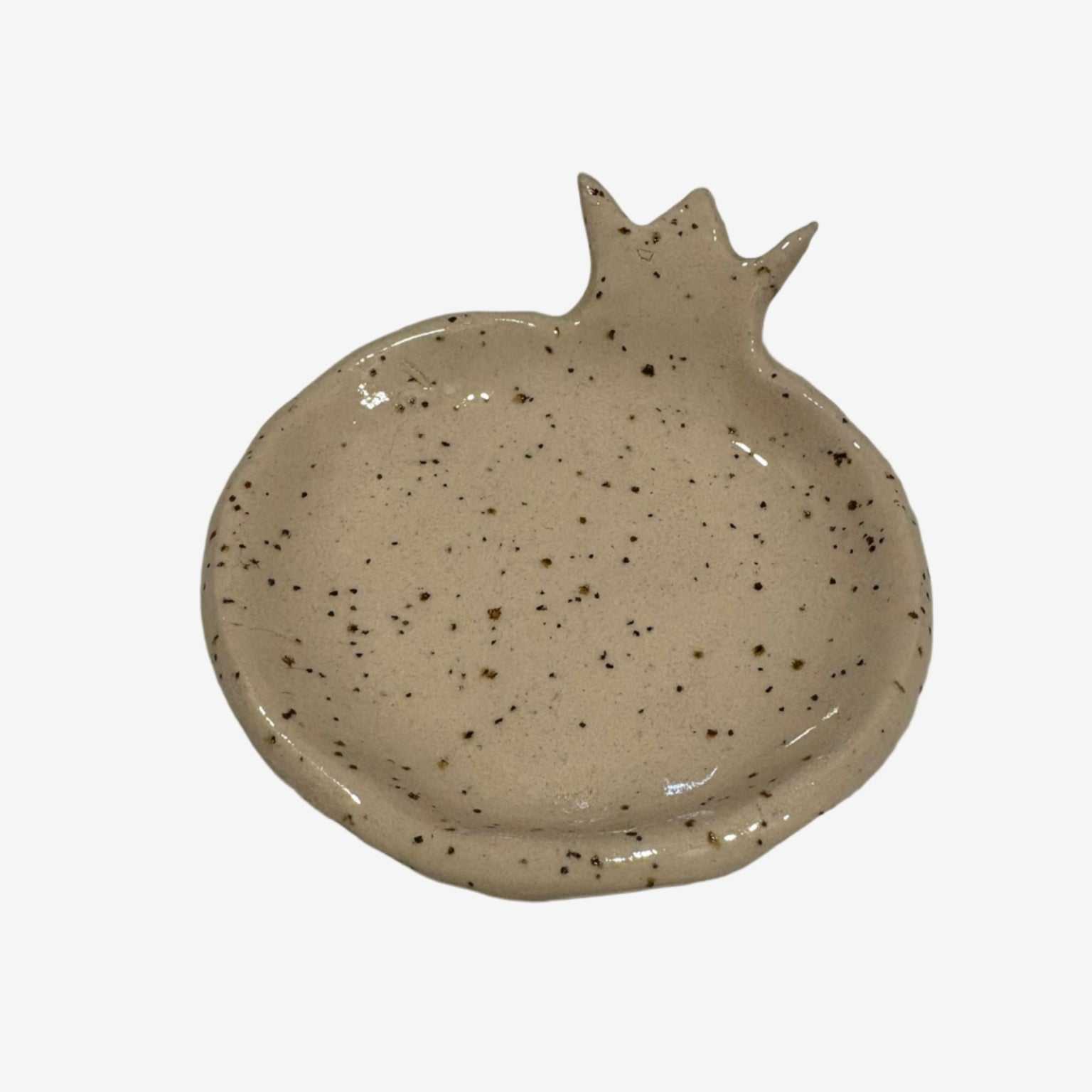Handcrafted speckled ceramic honey dish shaped like a pomegranate with glossy glaze from Beit Hamelacha