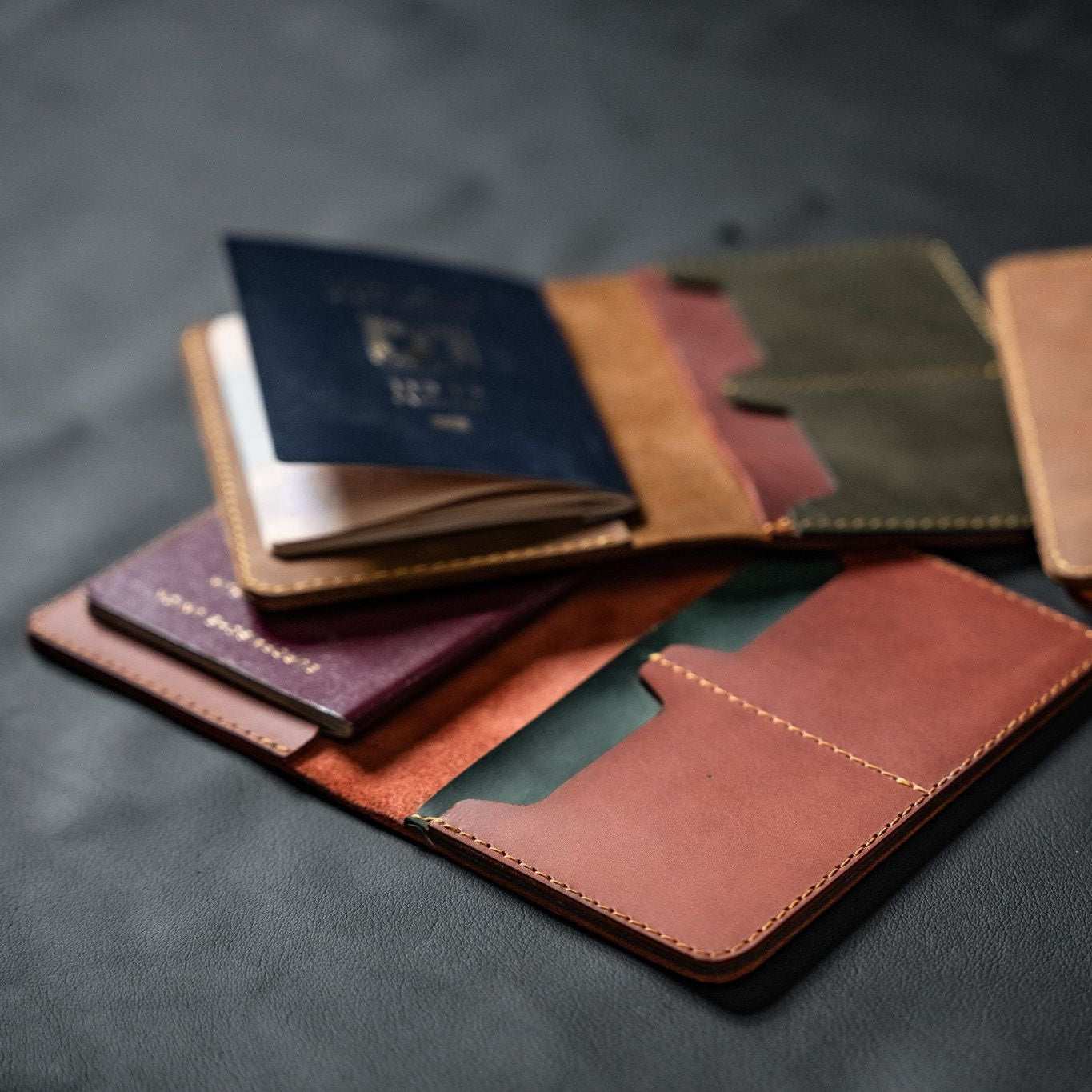 Handmade leather passport cover by Mor Sinai with slim design and card slots