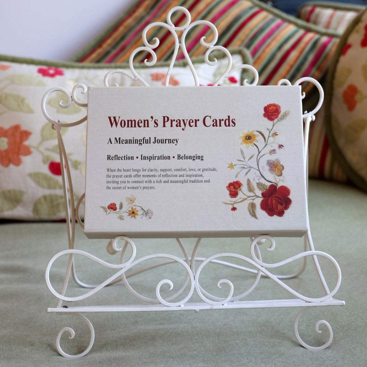 Box of Women’s Prayer Cards by Dr. Aliza Lavie featuring floral design on a decorative white metal stand