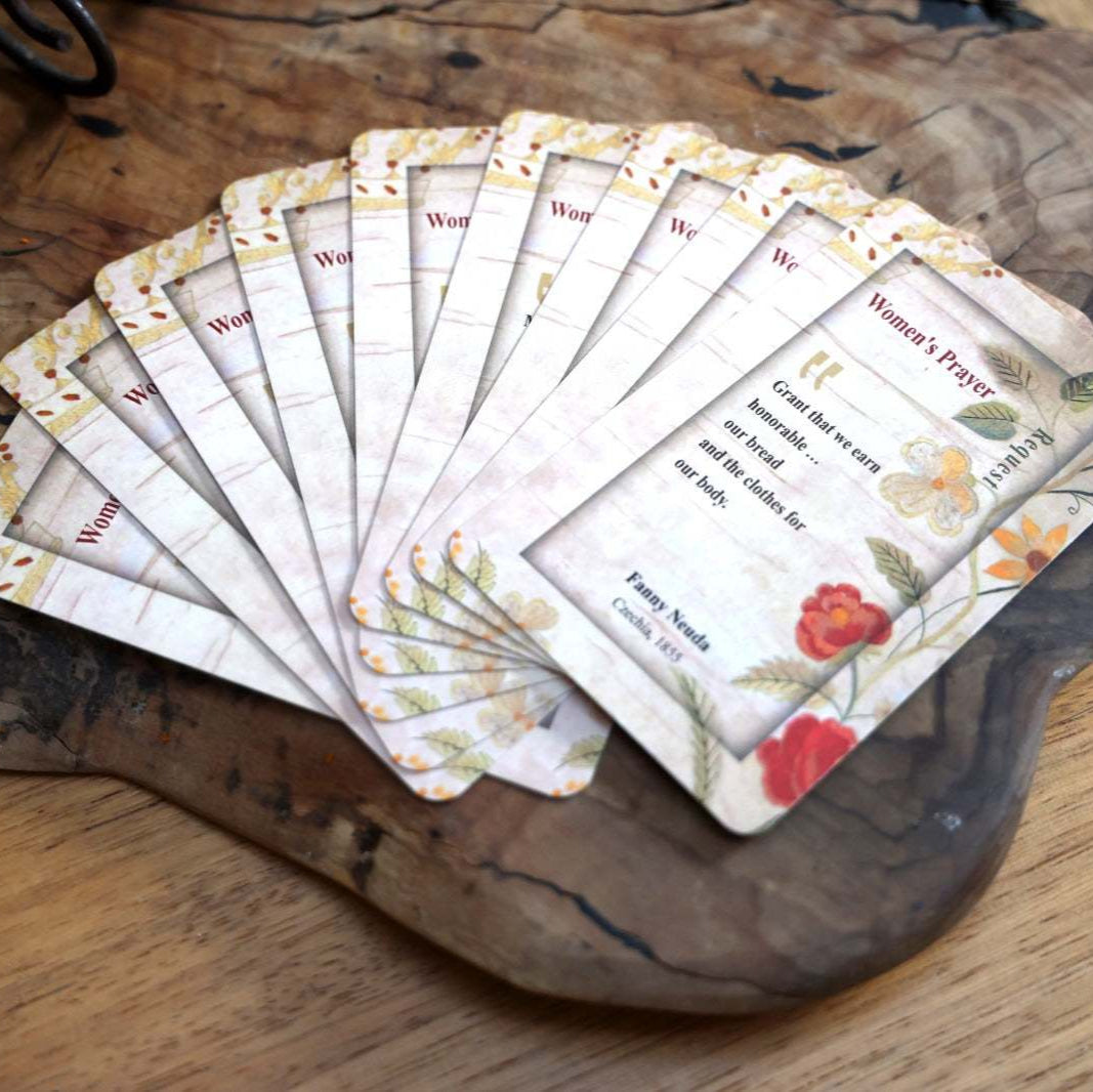 Set of Women’s Prayer Cards by Dr. Aliza Lavie with quotes, life themes, and reflective prompts on a wooden board