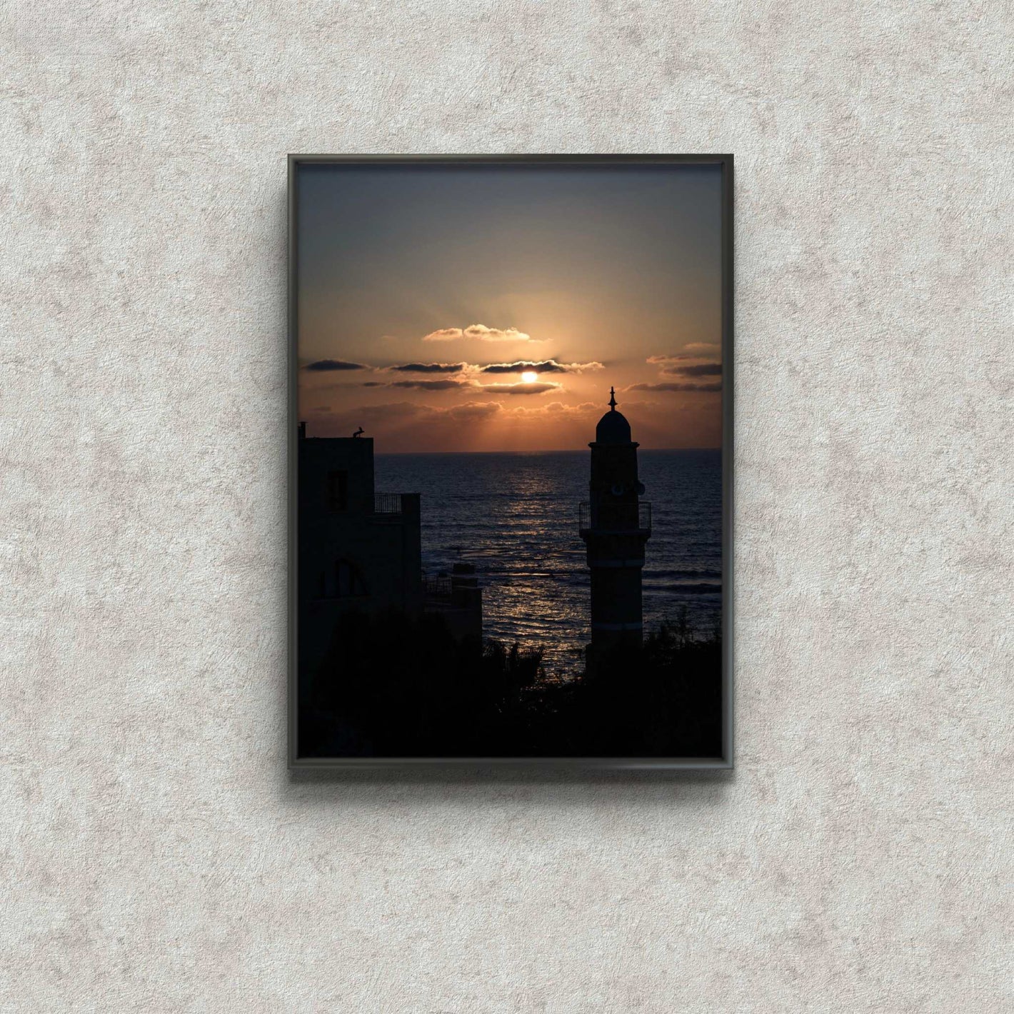 Jaffa at dusk framed print by Shye Klein showing sunset over city and sea with warm reflections