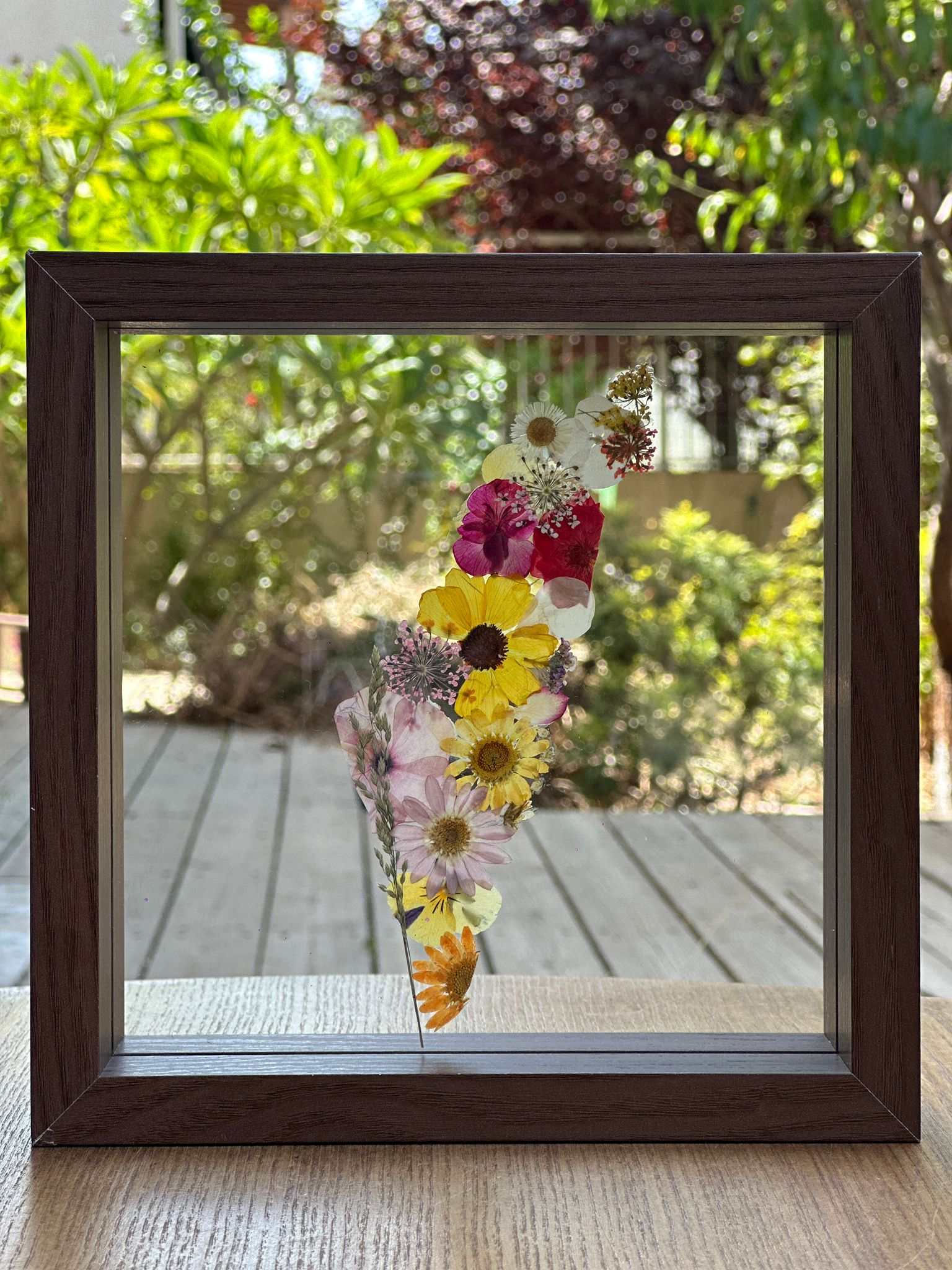 Pressed flowers framed map art of Israel in natural wooden frame with glass layers