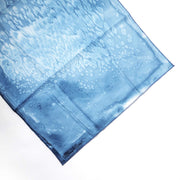ADI Silk Table Runner in blue silk with a subtle tonal floral pattern and softly textured finish.