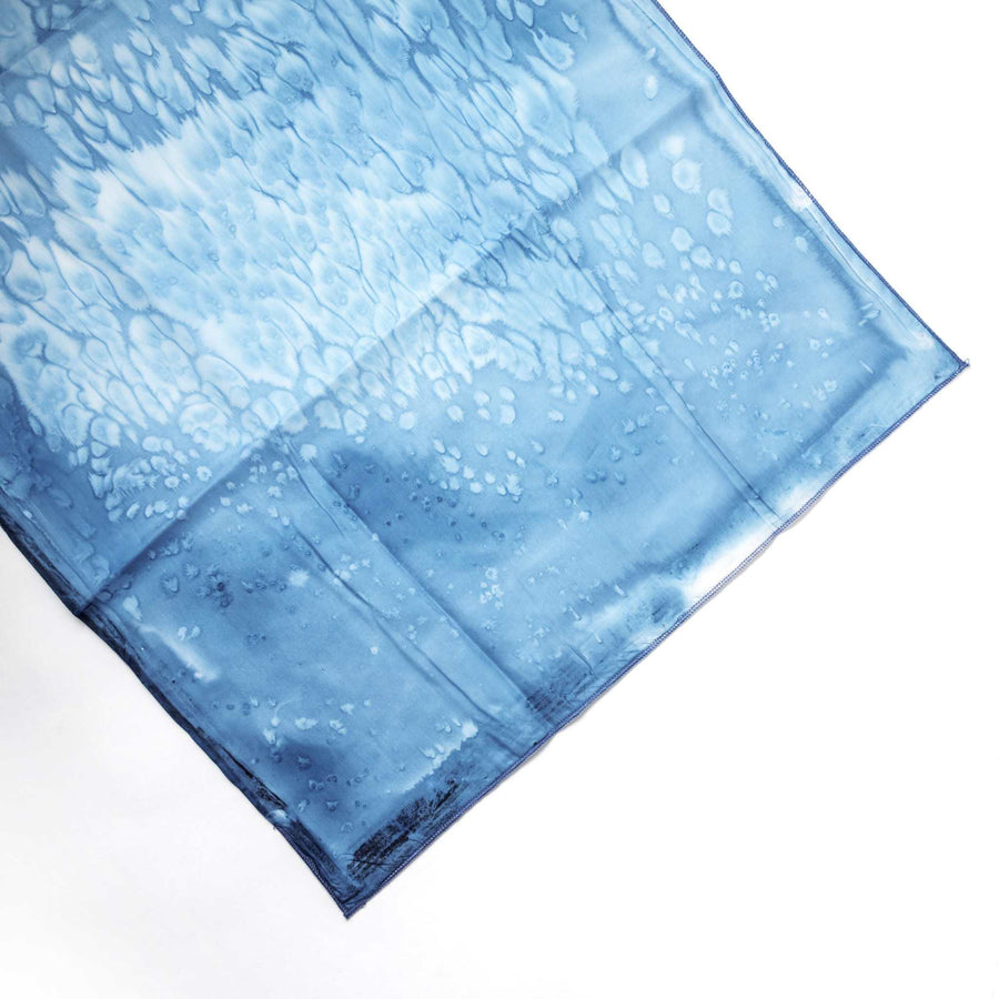 ADI Silk Table Runner in blue silk with a subtle tonal floral pattern and softly textured finish.