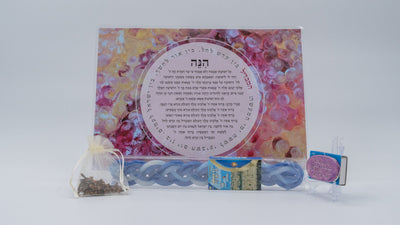 ADI Havdalah Set with a colorful floral blessing card, braided blue candle, spice pouch, and illustrated box.