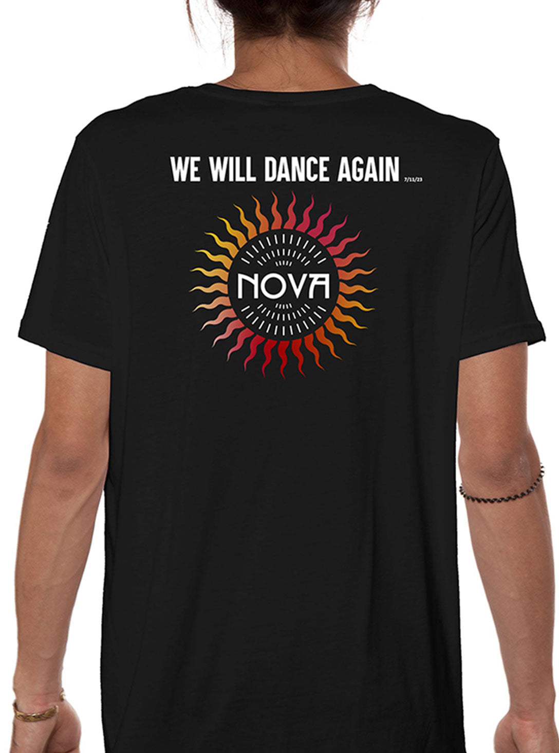 Nova Rising Sun T-Shirt in black, with a colorful red, orange and yellow sun graphic and “WE WILL DANCE AGAIN” text on the back.