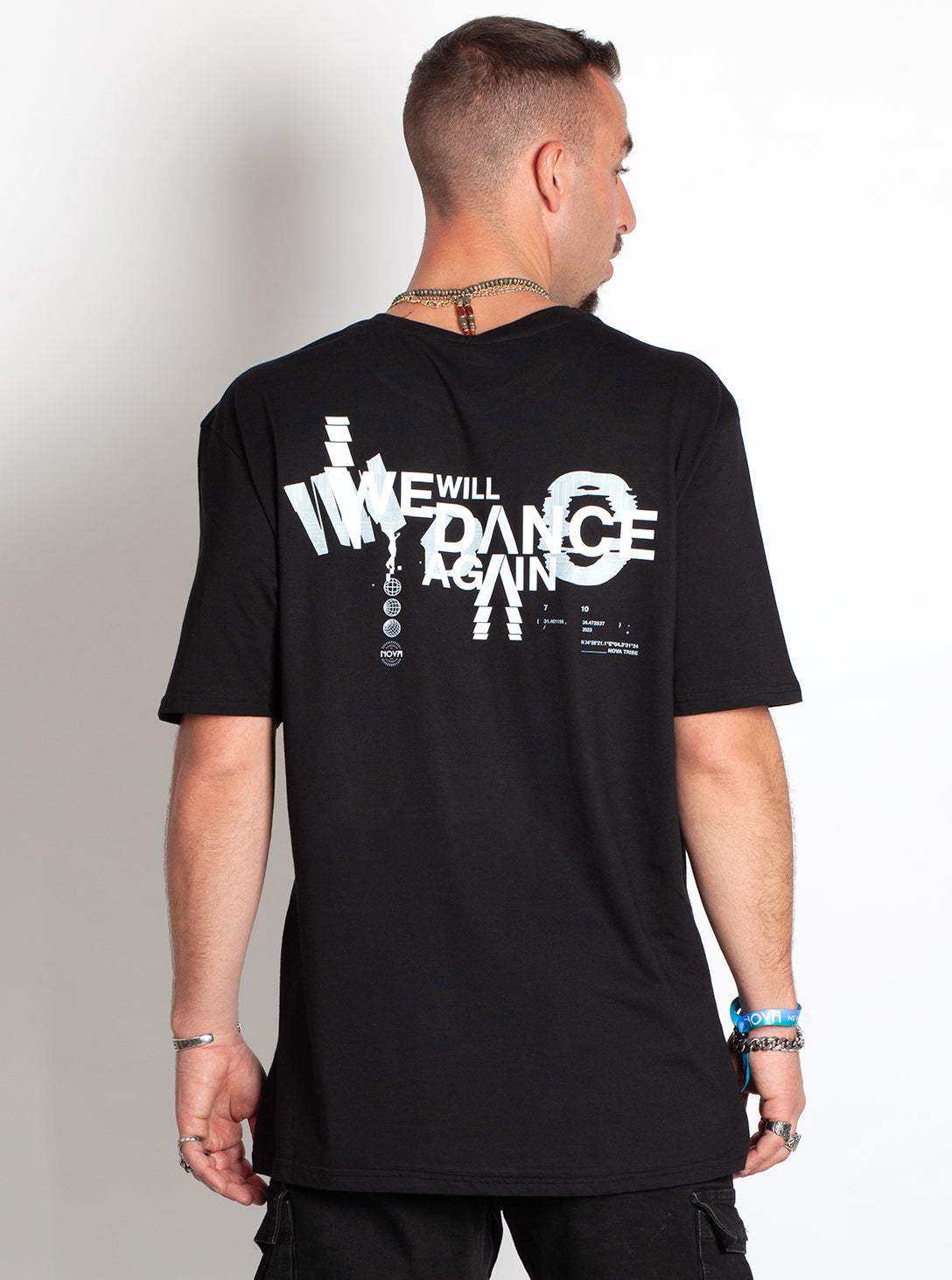 Nova We Will Dance Again T-Shirt in black cotton, featuring a bold white graphic and “We Will Dance Again” text across the back.