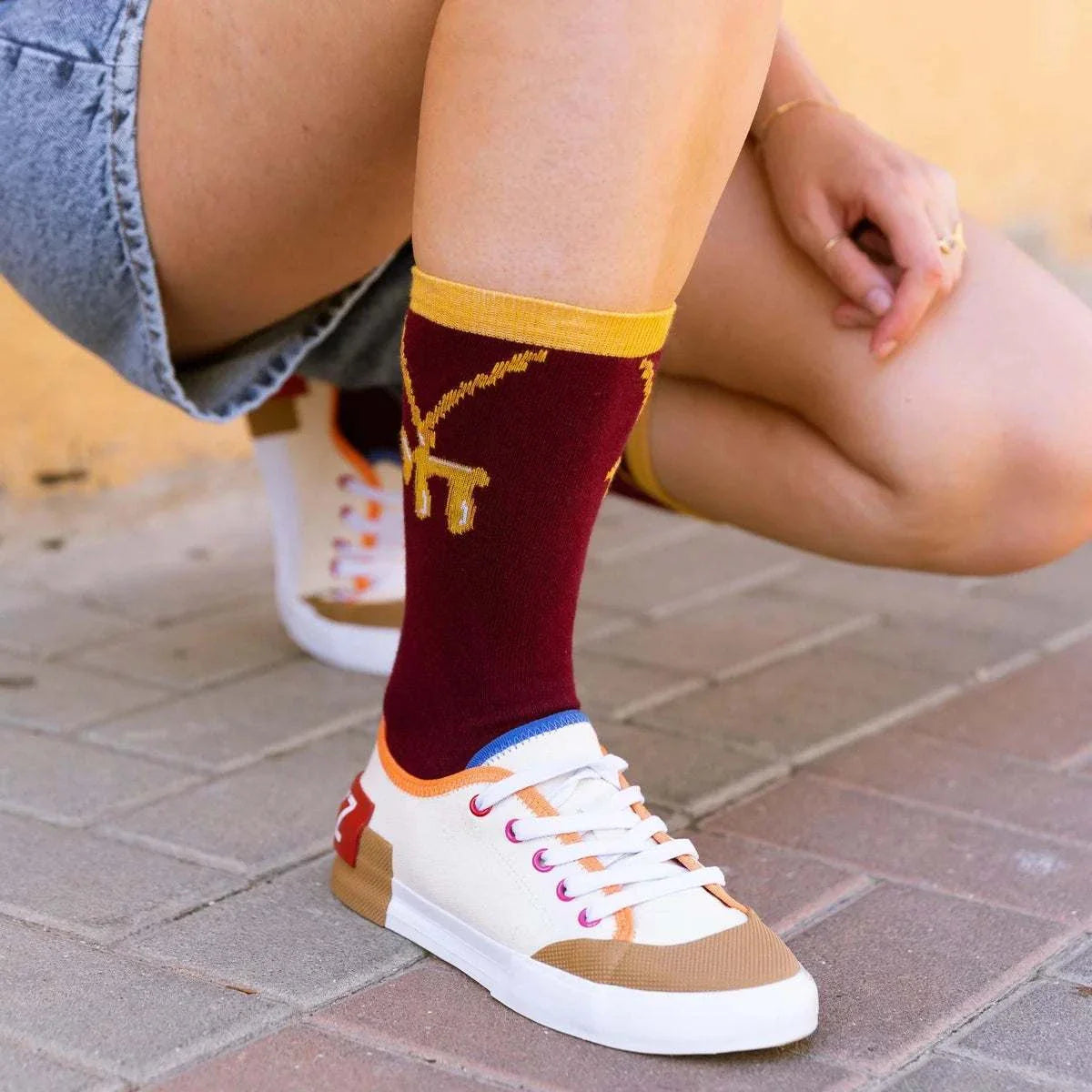Pair of Kremo Fun Socks featuring Hebrew Chai necklace design, made in Israel, size 41-46