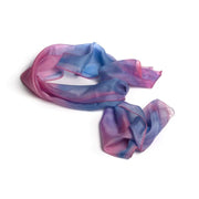 ADI Silk Scarf in sheer silk with flowing pink, purple and blue hues, featuring softly blended color and translucent folds.