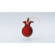 ADI Pomegranate Wall Decoration is a glossy red ceramic pomegranate ornament with a gold hanging loop and leafy crown.