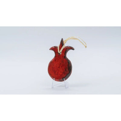 ADI Pomegranate Wall Decoration is a glossy red ceramic pomegranate ornament with a gold hanging loop and leafy crown.