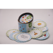 ADI A Family Meal Card Game in a blue gingham tin with round illustrated cards featuring colorful food and family prompts.