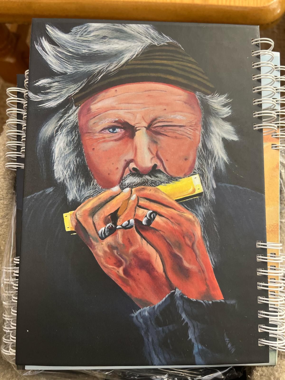 A5 notebook featuring colorful Israeli art by Dikla Carmely with bold, expressive cover design