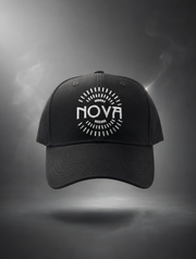 Nova Logo Snapback Hat in black, made of textured fabric with a curved brim and white radial Nova emblem on the front.