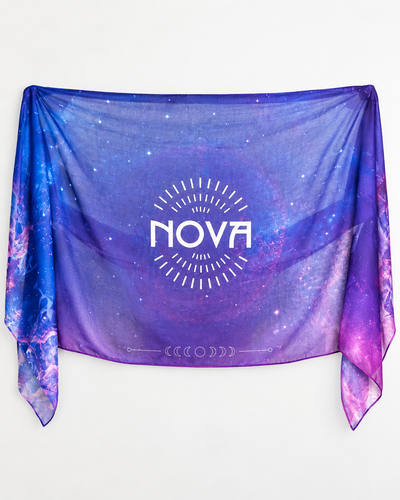 Nova Shawl — Purple, lightweight sheer fabric with a blue-purple galaxy print, pink edges and bold white NOVA logo.