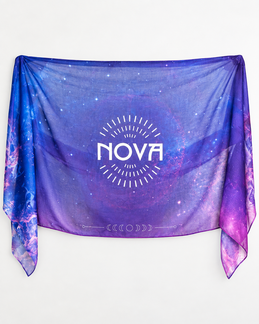 Nova Shawl — Purple, lightweight sheer fabric with a blue-purple galaxy print, pink edges and bold white NOVA logo.