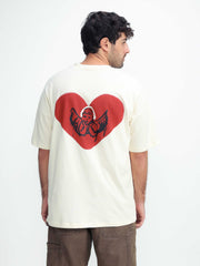 Omer Wenkert Heart T-Shirt in off-white cotton, featuring a large red heart and illustrated winged figure on the back.