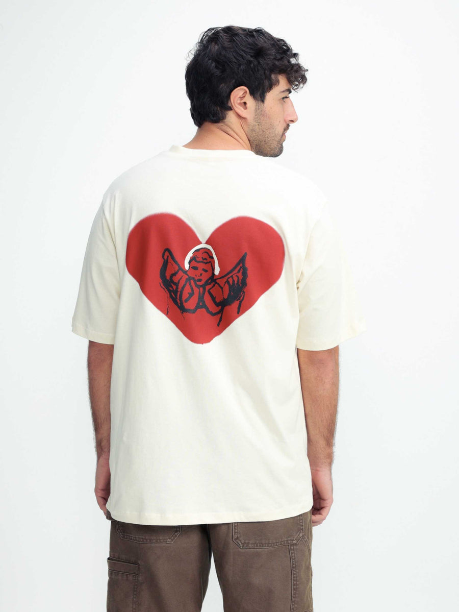Omer Wenkert Heart T-Shirt in off-white cotton, featuring a large red heart and illustrated winged figure on the back.
